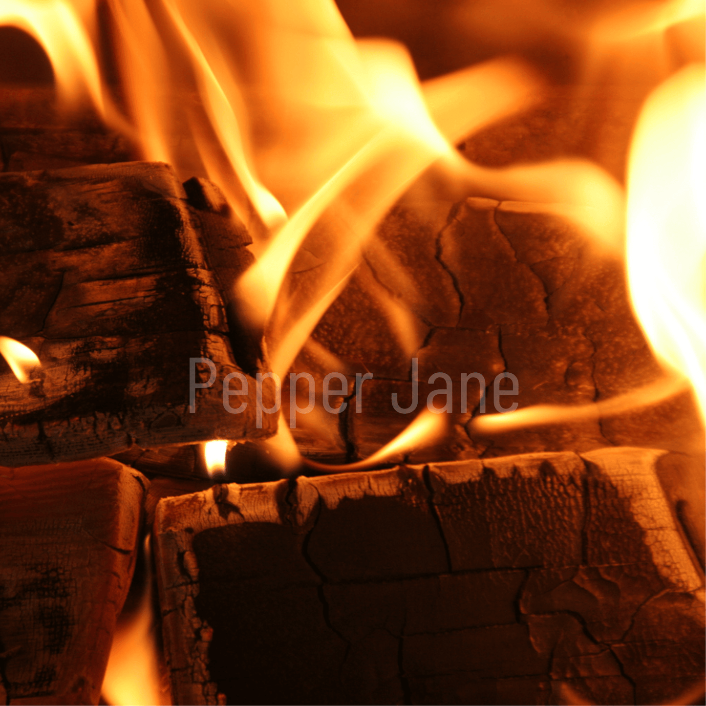 Crackling Firewood Fragrance Oil evokes the essence of a cozy evening by the fire.
